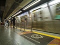 Passengers wait for the train to arrive on the platform of blue line 1 of the Sao Paulo city subway