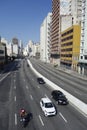 Sao Paulo cityscape: vehicles traffic, city architecture, Prestes Maia avenue