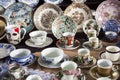 Sao Paulo / Sao Paulo / Brazil - 08 19 2018: Group of elegant cups and plates with colored texture displayed at a table