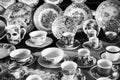 Sao Paulo / Sao Paulo / Brazil - 08 19 2018: Group of elegant cups and plates with vivid texture displayed at a table. [B&W v]