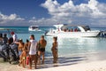 Boarding tourists on passenger ships of a tropical island