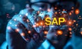 SAP Systems Applications and Products enterprise software solutions concept. Globe surrounded by application icons representing