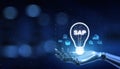 SAP Systems Applications and Products Illustrated with a Robot Hand Pressing a Button on a Virtual Screen. 3D render