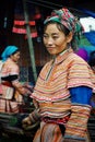 young flower hmong tribe member woman at the local farmer market high up in the mountains