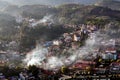 Sapa valley city in the mist in the morning, Vietnam. Royalty Free Stock Photo