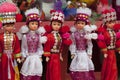 Dolls girls in red national clothes Red dzao - a small nation of North Vietnam