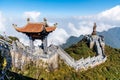SAPA, VIETNAM - MAR 14, 2019 Statue of the Guan-Yin Buddha and Pavilion on Fansipan mountain peak the highest mountain in Royalty Free Stock Photo