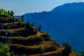 Sapa, Vietnam - Mar 01, 2020: Two farmers are working on terraced fields in the sky gate area. Royalty Free Stock Photo