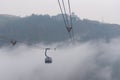 Sapa Vietnam Tourist travel by cable car to Fansipan peak in morning fog,the highest mountain in the Indochinese Peninsula with