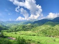 Slow life with mountains view and green fields Royalty Free Stock Photo