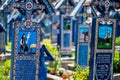 Sapanta, Maramures, Romania - June 17, 2022: Painted blue wooden monuments in an unique in the World