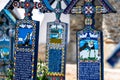 Sapanta, Maramures, Romania - June 17, 2022: Painted blue wooden monuments in an unique in the World