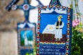Sapanta, Maramures, Romania - June 17, 2022: Painted blue wooden monuments in an unique in the World