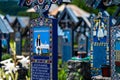 Sapanta, Maramures, Romania - June 17, 2022: Painted blue wooden monuments in an unique in the World