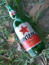 Sape Indonesia April 24, 2023 - Green Bottle of Bintang Beer, Indonesian Beer, Between the Bush