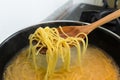 Sapghetti cooking in hot water Royalty Free Stock Photo