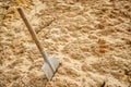 Sapper shovel in sand Royalty Free Stock Photo