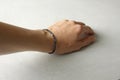Sapphire bracelet. A bracelet made of stones on a hand from a natural stone Sapphire. Bracelet made of natural stones. Handmade Royalty Free Stock Photo