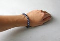 Sapphire bracelet. Bracelet made of stones on hand from natural stone Sapphire. Bracelet made of natural stones. Handmade jewelry Royalty Free Stock Photo