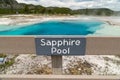 Sapphire Pool, located in Biscuit Basin, in Yellowstone National Park is a geothermal hot spring feature. Sign Royalty Free Stock Photo