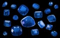 Sapphire Set of real blue jewels isolated on transparent background Princess cut jewel Round cut jewel Emerald cut jewel Oval Royalty Free Stock Photo