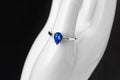 Sapphire teardrop and Diamond 14 karat white gold ring Royalty Free Stock Photo