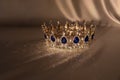 Sapphire vintage crown. Symbol of success, monarchy and wealth Royalty Free Stock Photo