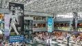 Sapporo, Hokkaido, Japan - Domestic terminal atrium of New Chitose Airport. Advertising hanging banners about Nippon-Ham Fighters.