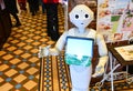 Sapporo, Japan - March 4, 2018 : `Pepper` robot assistant with information screen in duty to give information to the tourists