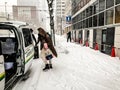 Sapporo, Japan - November 17 2019 : Unidentified pedestrians go to taxi in Sapporo City during winter season