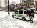 Sapporo, Japan - November 17 2019 : Unidentified pedestrians go to taxi in Sapporo City during winter season