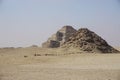 Saqqara, Egypt: The Pyramid of Userkaf and the Step Pyramid of Djoser Royalty Free Stock Photo
