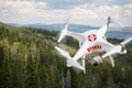 SAR - Search and Rescue Unmanned Aircraft System, UAS Drone Flying Above A Mountain Forest Royalty Free Stock Photo