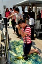 Saraburi, Thailand: Man Praying at Temple