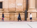 SARAGOSSA, SPAIN - SEPTEMBER 27, 2017: The nun is walking down the street. Copy space for text.