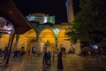 People praying in front of Gazi Husrev Begova mosque in Sarajevo. Royalty Free Stock Photo