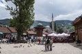 Sarajevo, Bosnia and Herzegovina, Bascarsija, Sebilj, fountain, old town, square, mosque, minaret, skyline, bazaar, market Royalty Free Stock Photo