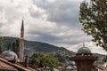 Sarajevo, Bosnia and Herzegovina, Bascarsija, Sebilj, fountain, old town, square, mosque, minaret, skyline, bazaar, market Royalty Free Stock Photo