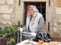 Older Woman With Traditional Dress In Sarajevo, Bosnia And Herzegovina