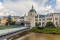 SARAJEVO, BOSNIA AND HERZEGOVINA - JUNE 11, 2019: The Academy of Fine Arts and Festina lente pedestrian bridge over the Royalty Free Stock Photo