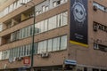 SARAJEVO, BOSNIA AND HERZEGOVINA - JUNE 12, 2019: Breitling watch advertisement on a bullet holes ridden house in