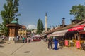 SARAJEVO, BOSNIA AND HERZEGOVINA - JUNE 11, 2019: Sebilj wooden fountain ot the square in Bascarsija disctrict of Royalty Free Stock Photo