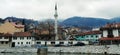 Sarajevo, Bosnia and Herzegovina - March 8, 2020: Sheher bridge over the Milatsk river. Spring. Turbid water in the river and bare