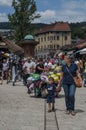 Sarajevo, Bosnia and Herzegovina, Bascarsija, Sebilj, fountain, old town, square, mosque, minaret, skyline, bazaar, market Royalty Free Stock Photo