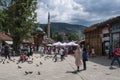 Sarajevo, Bosnia and Herzegovina, Bascarsija, Sebilj, fountain, old town, square, mosque, minaret, skyline, bazaar, market Royalty Free Stock Photo