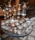 Sarajevo, Bosnia - May 2, 2022 - Copper, silver and brass tableware for sale in shop