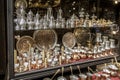 Sarajevo, Bosnia - May 2, 2022 - Copper, silver and brass tableware for sale in shop