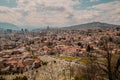 Sarajevo city skyline in the distance, with a beautiful mountain range in the background Royalty Free Stock Photo