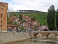 Sarajevo Old Town and the Seher-cehajina Bridge over Miljacka River, Sarajevo, Bosnia and Herzegovina on May 2nd 2016 Royalty Free Stock Photo