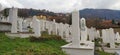 Sarajevo, Yusnia and Herzegovina, March 8, 2020. Muslim cemetery with white monuments and pillars against the sky and distant